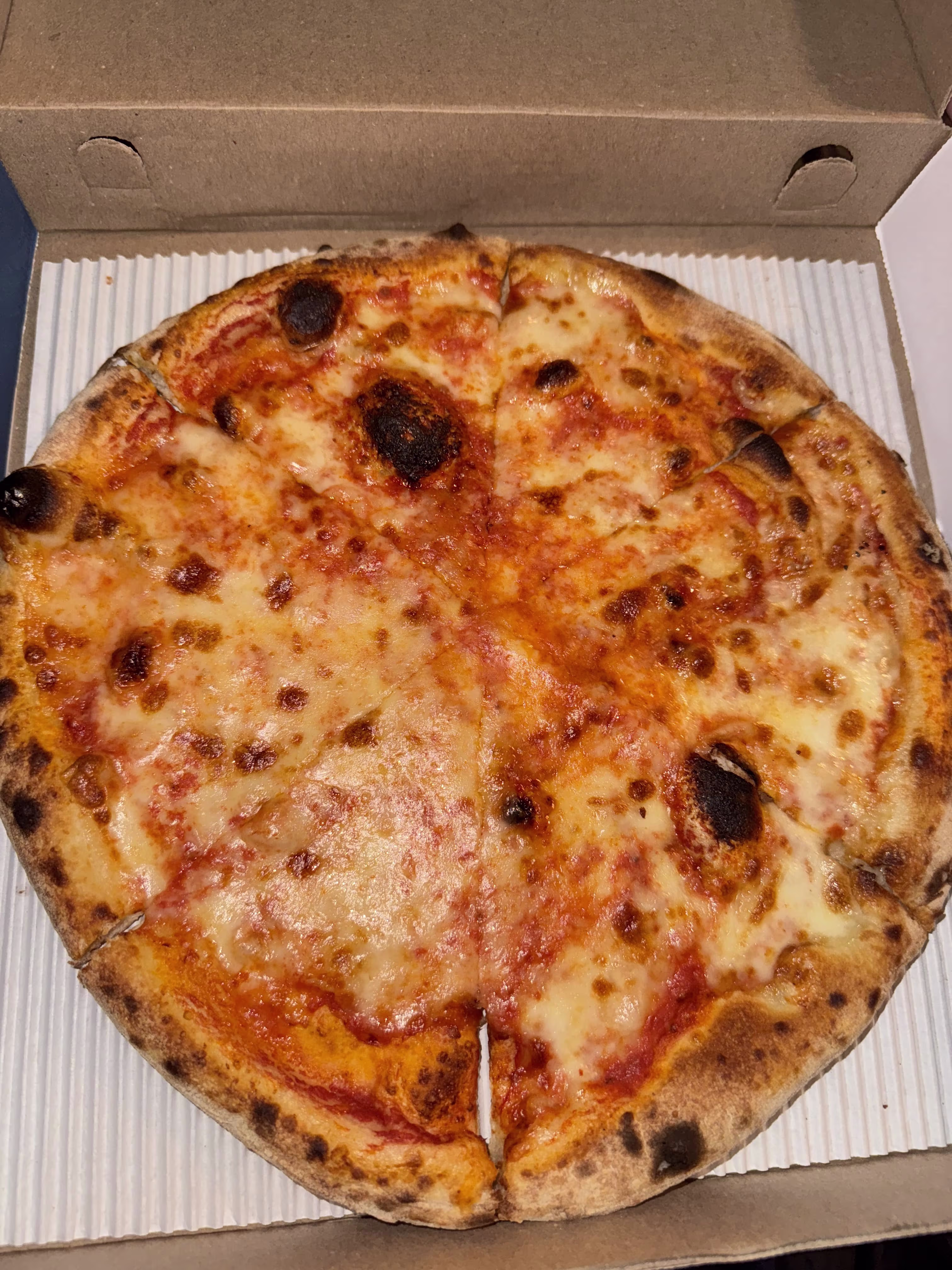 A Photo of Pizzana's Cheese Pizza. 