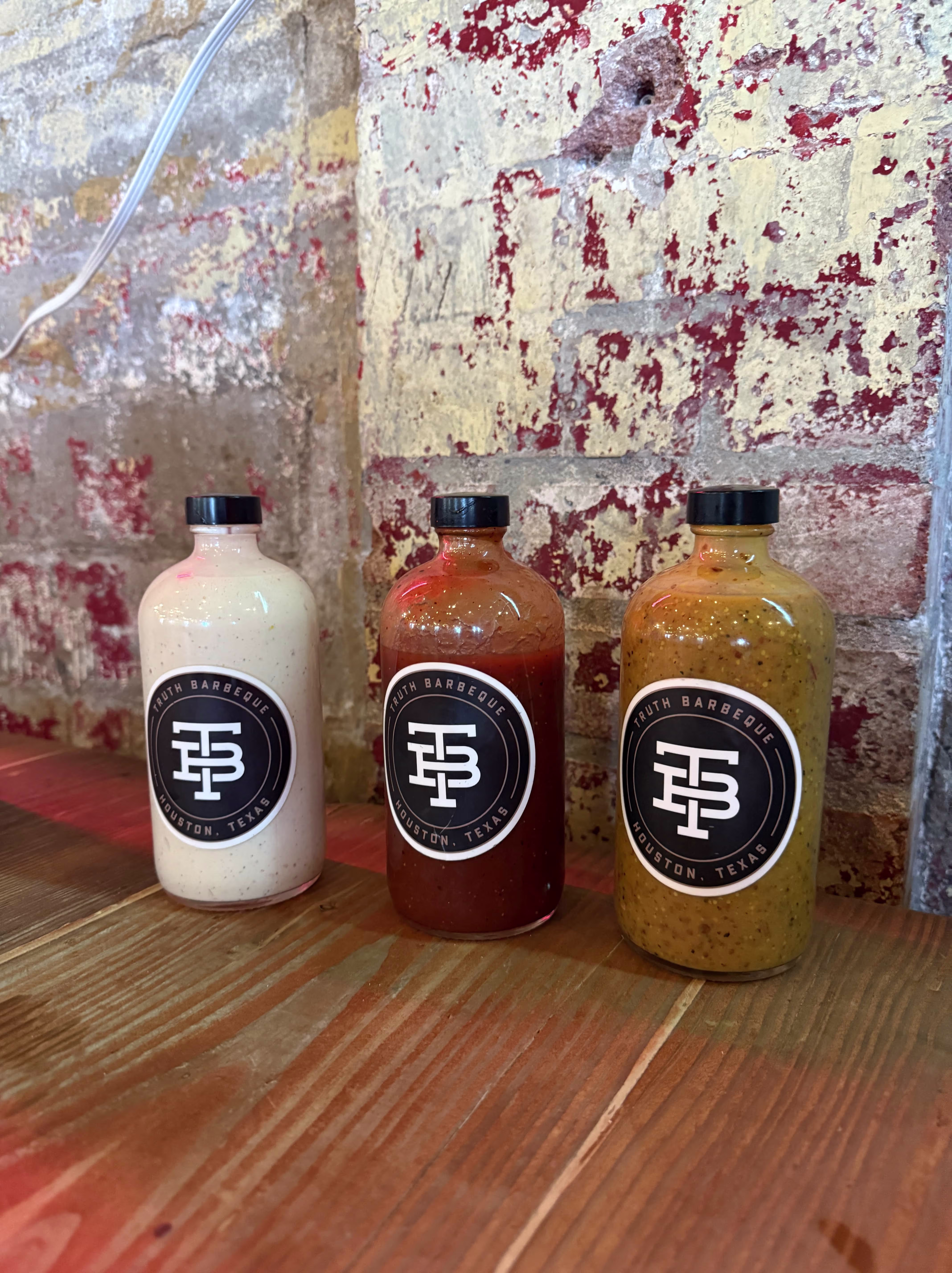 A Photo of the Home Made Sauce's At Truth BBQ