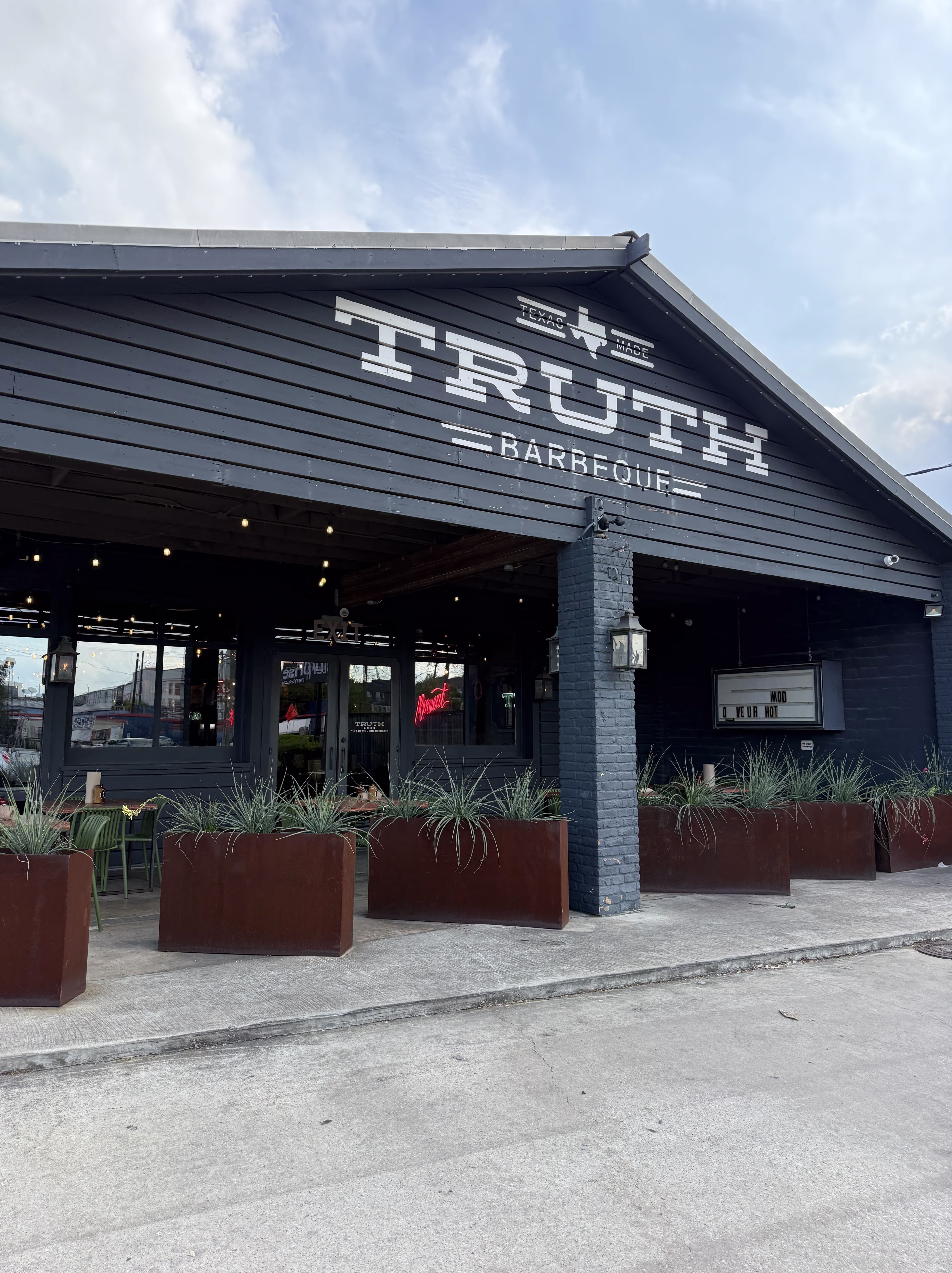 A photo of the front of Truth BBQ. 