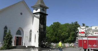 Pastor reacts to century-plus-old church catching fire, official says inside fine to proceed