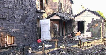 Fire destroys 2 homes, badly damages another in Banks Twp.