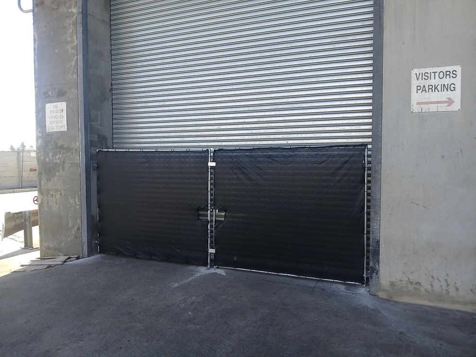 Galvanised steel gates with diamond mesh covered in shade cloth