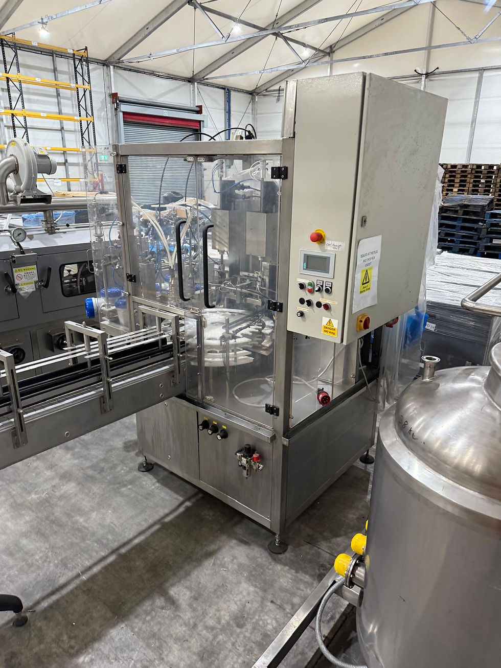 Thumbnail: Wick Und Schaefer Rotary Filler with Bottle Cap Sorter and Bottle Capper