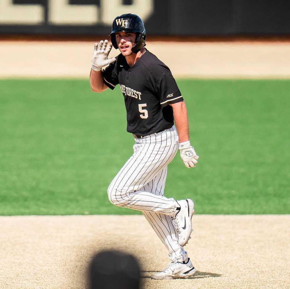 Pierce Bennett signaling to the dugout after a home run