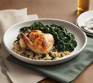 Roasted chicken with barley pilaf and sautéed spinach
