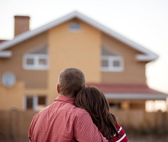 Couple Facing Home