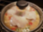 fish fillets poaching in covered saucepan