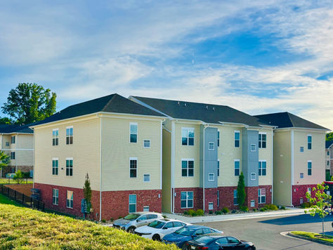 24 tightly efficient apartments for Berkeley County, each with a combined kitchen, living, and dining space that lives larger than its square footage, plus a full ensuite bedroom set apart from it all