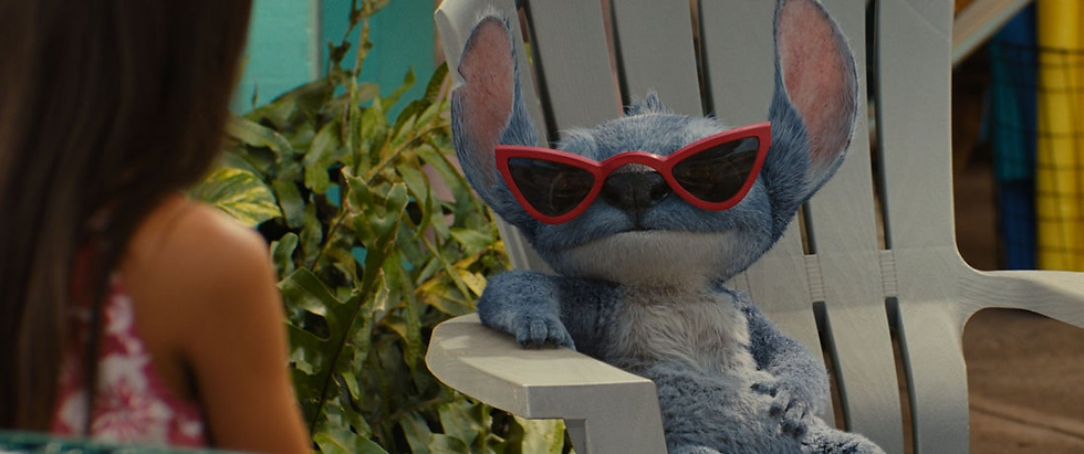 (L-R) Maia Kealoha as Lilo and Stitch in Disney’s live-action LILO & STITCH. Photo courtesy of Disney. © 2025 Disney Enterprises Inc. All Rights Reserved.