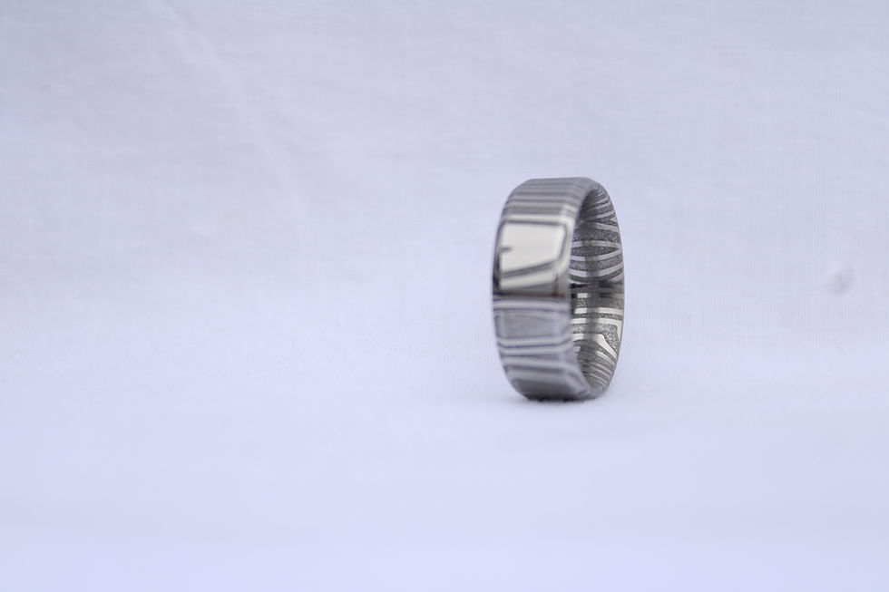 Thumbnail: Sharktooth Damascus Ring