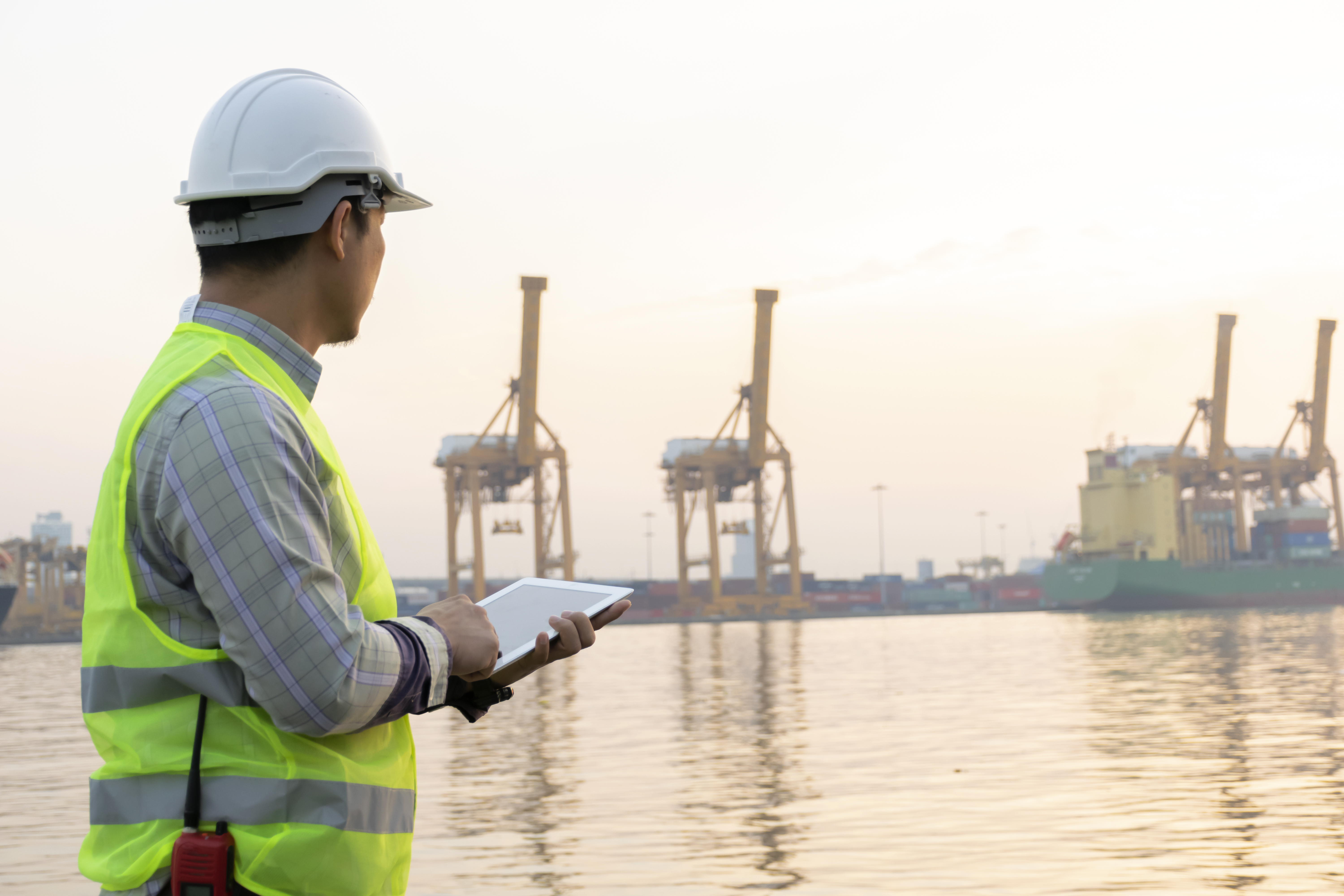 engineering-is-using-tablet-check-details-use-work-order-flexibility-cargo-handling-backgr