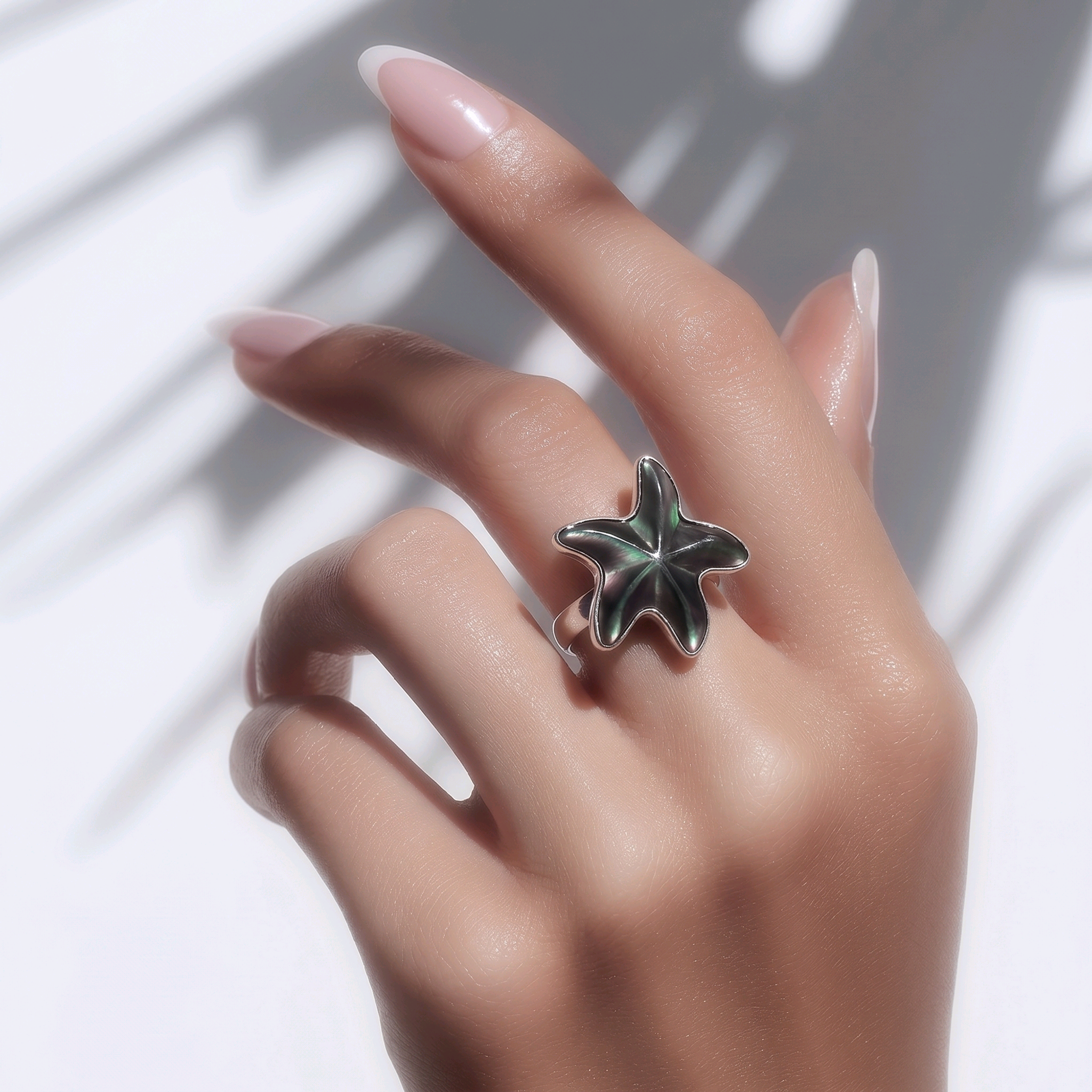 Anillo estrella de madre perla