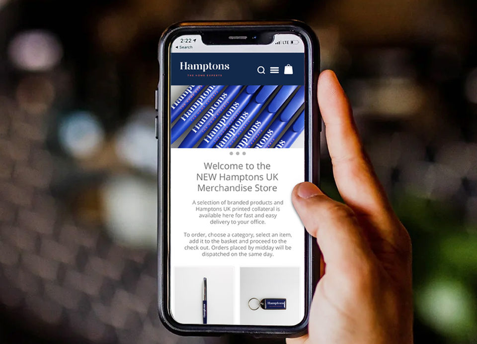 Smart phone showing a bespoke merchandise store.