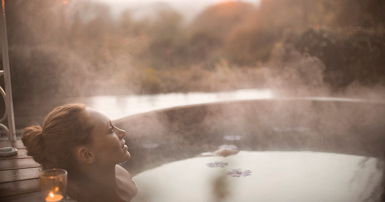 Woman in outdoor spa