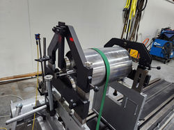 An indsutrial drum being rotated and balanced in Blountvilel Tennessee
