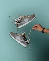 man lets sneakers float  nike sb dunk low big money savings