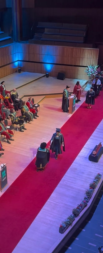 Susan receiving her Masters in Psychology