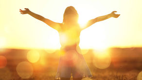 Woman in natural light representing neurological and emotional recovery after ER-positive breast cancer treatment