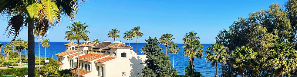 Elegant Spanish coastal villa with sea views, representing the lifestyle many UK retirees seek through the Non-Lucrative Visa