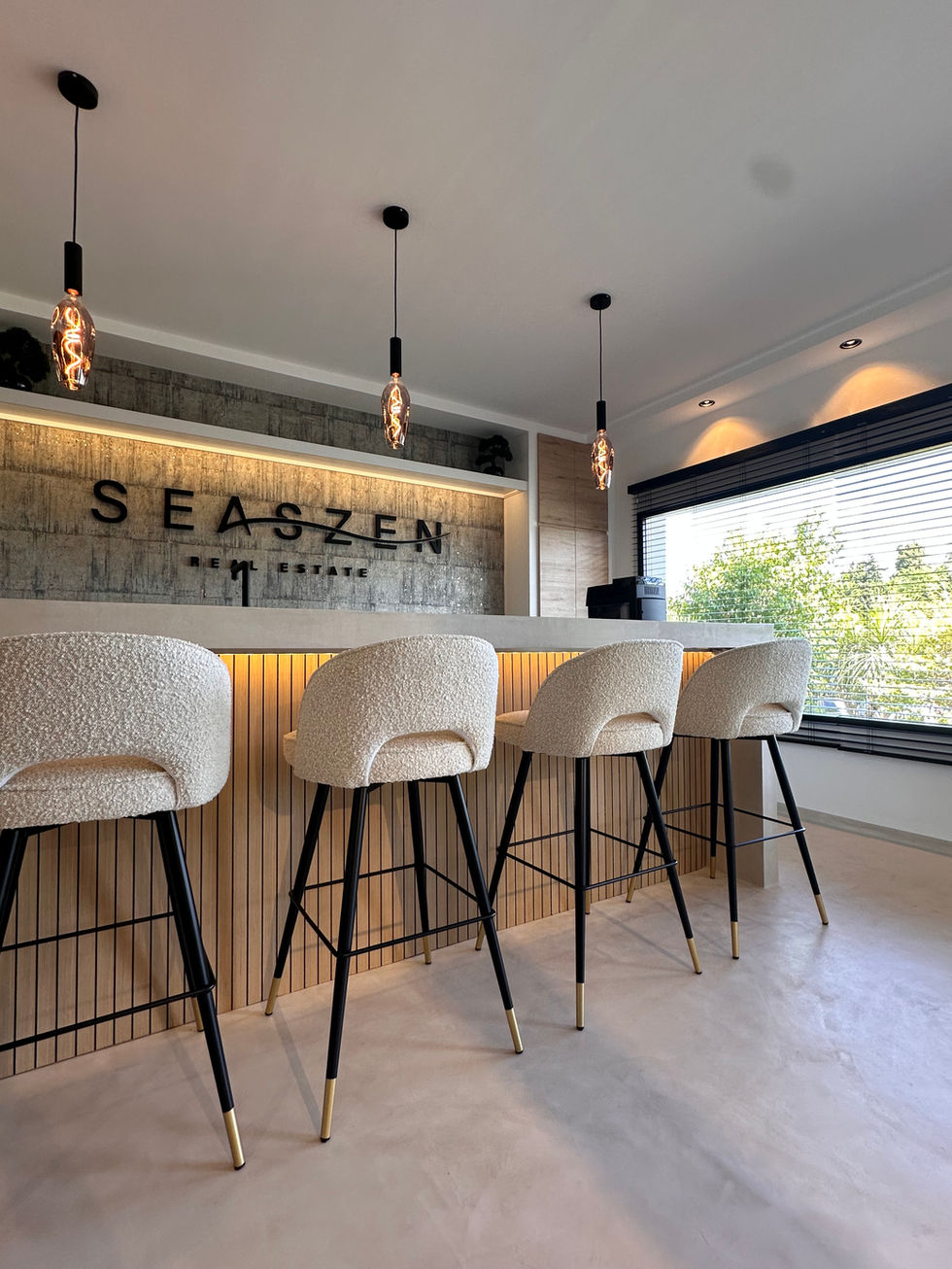 Seaszen Real Estate a row of bar stools in front