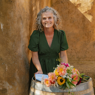 The celebrant standing by the signing barrel.