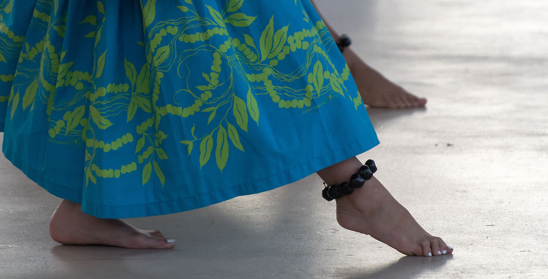 An image of a Hawaiian dancer's foot with an anklet