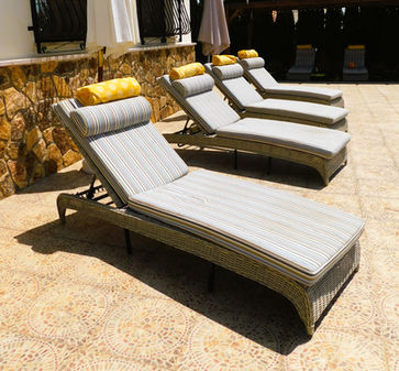 Comfortable soft sun loungers with headrests. Beach towels supplied for the pool