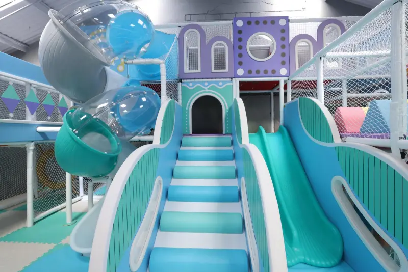 Large indoor play area with pastel colours.