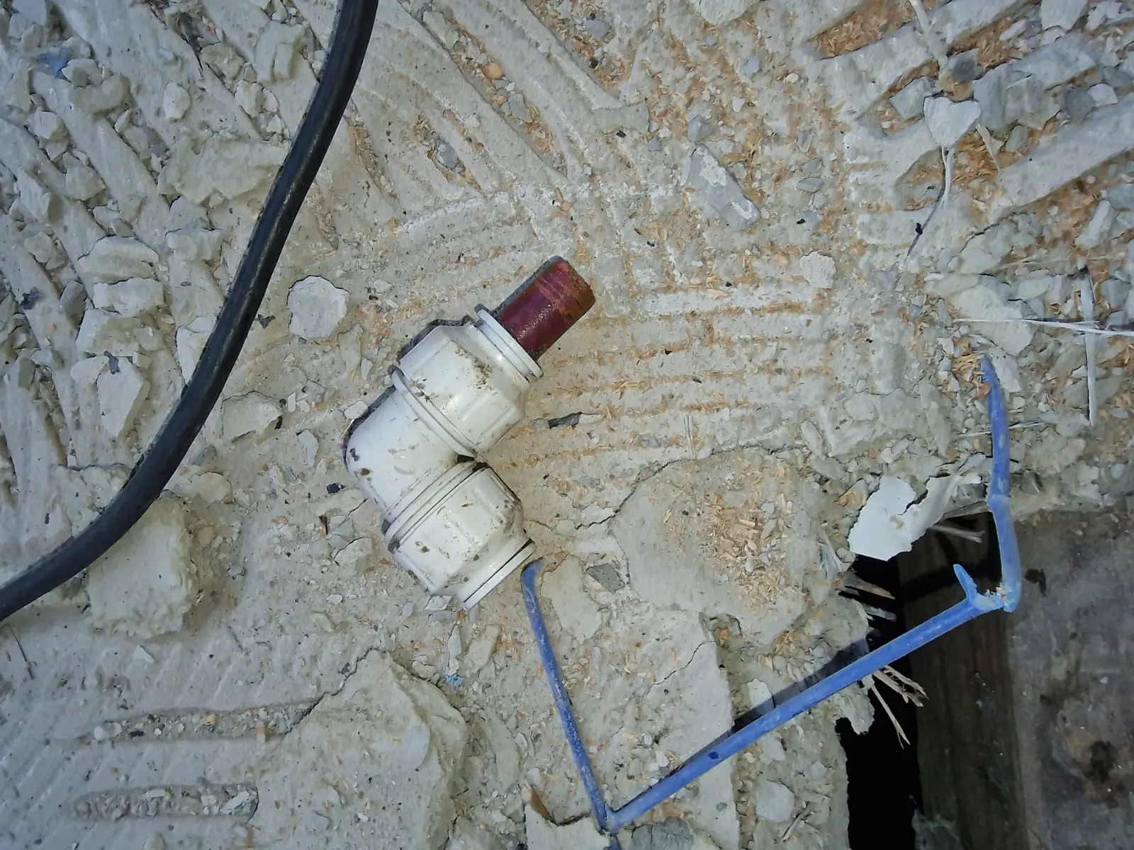 Close-up shot of paperwork and joined elbow paperwork, which have failed those detecting the leak a success.
