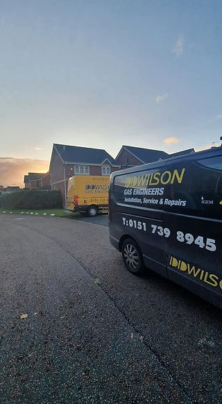 DDWilson Work Vans Outside Customers Home Ready To Start Work