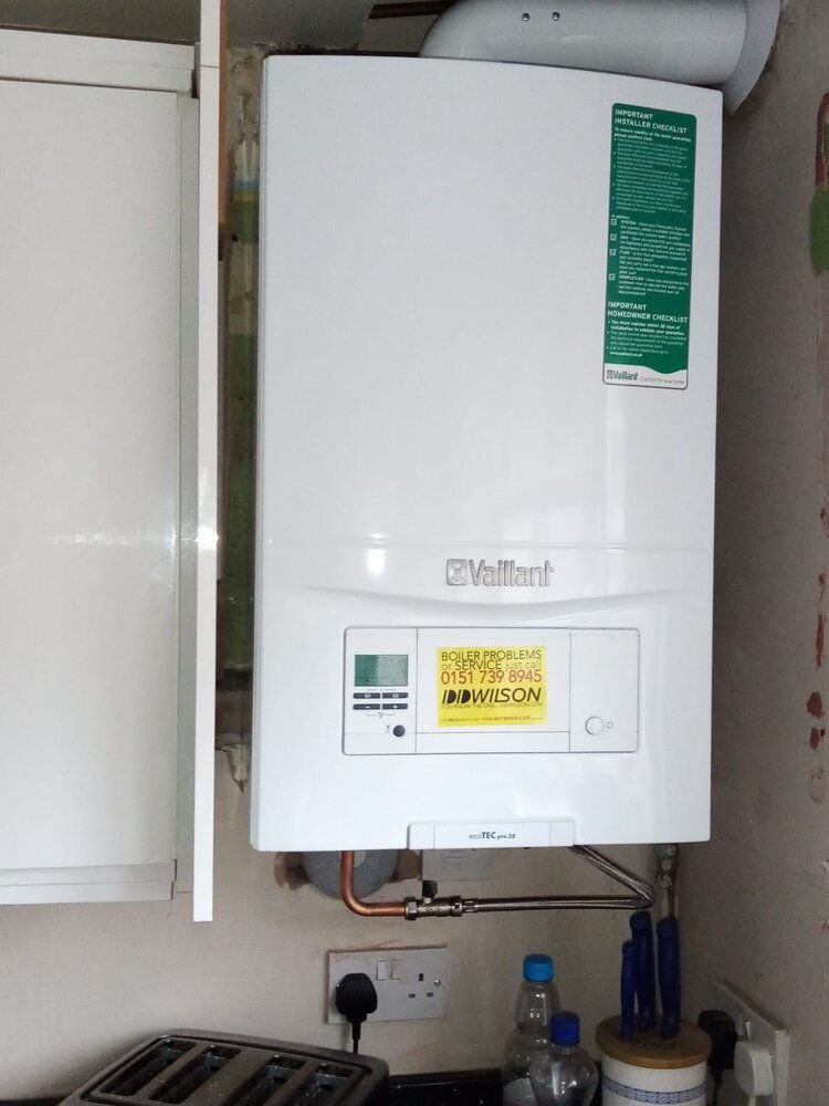 New boiler with a ddwilson sticker on the front