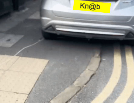 Car parked over double yellow