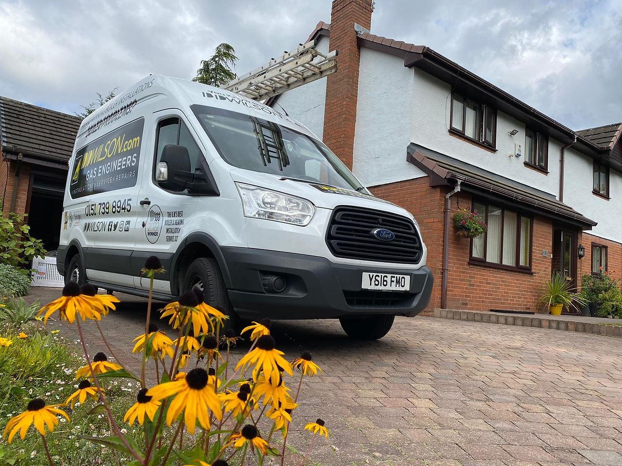 White DDWilson van Outside Property 