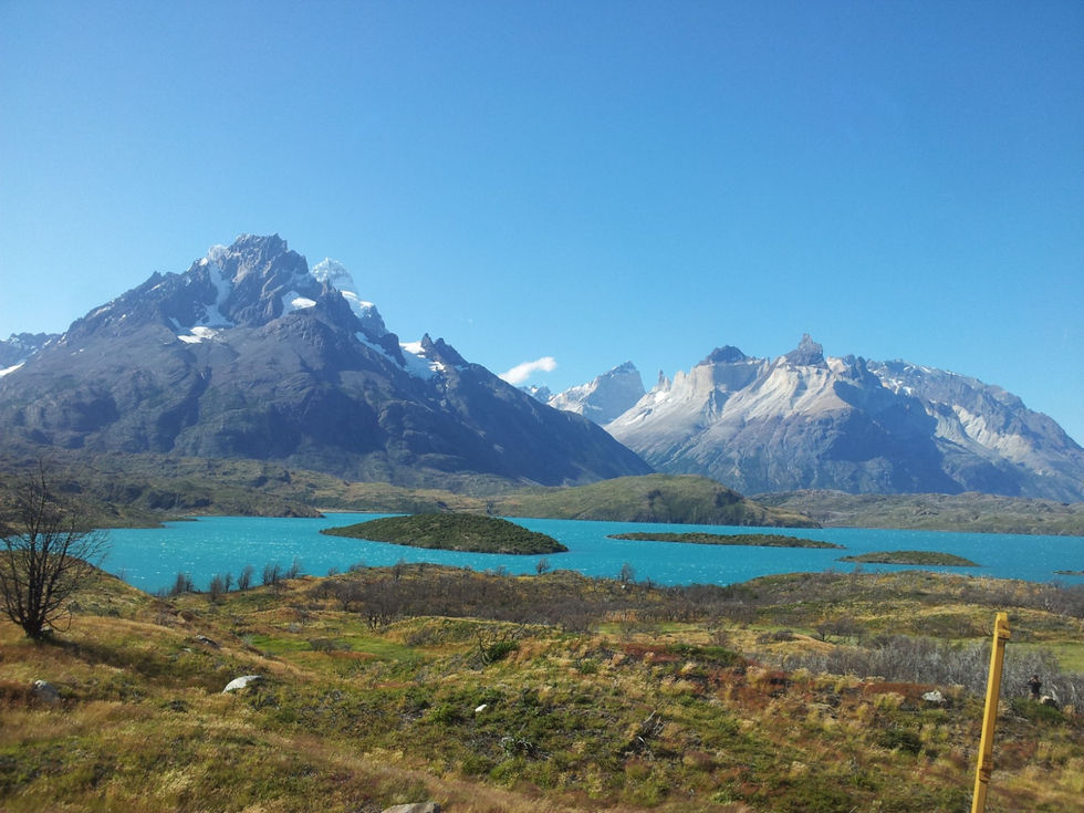 Lake in the front, and mountains in the back.