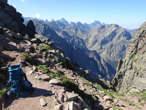 A backpack with a mountain view