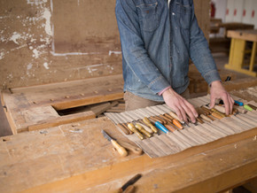 Carpenter Organizing his Tools