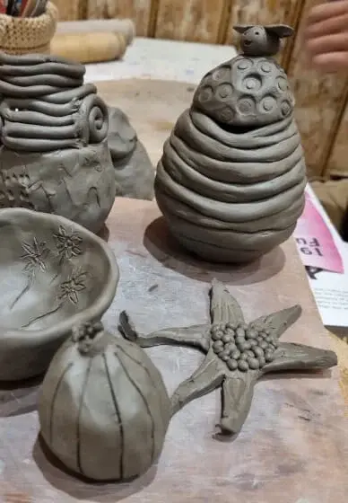 Thumbnail: creations made from clay at pottery class in london