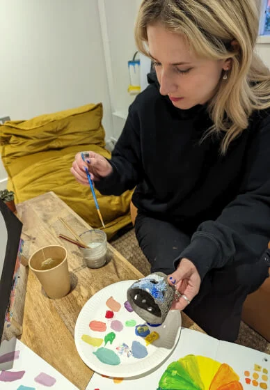 painting a pottery pot