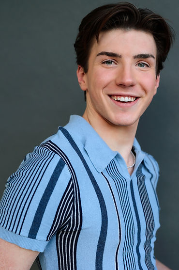 Headshot- Luke Swaller.JPG