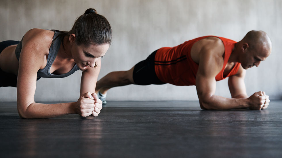Eye-level view of someone performing a plank in a fitness studio