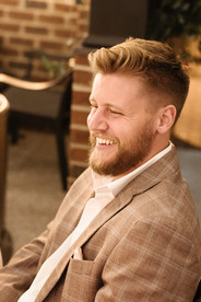 Candid moment of a guest laughing hard