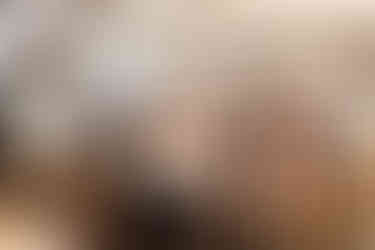 Candid moment of the guests welcoming the bride and groom at rehearsal dinner