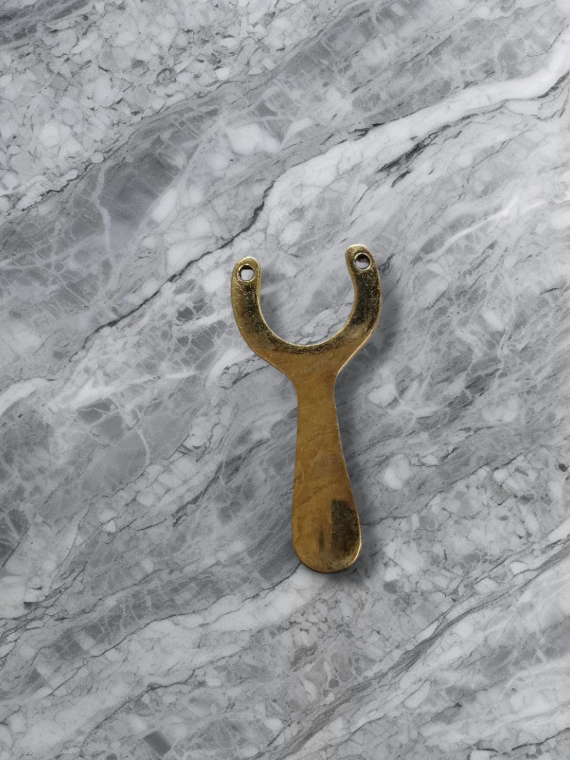 Brass poacher catapult