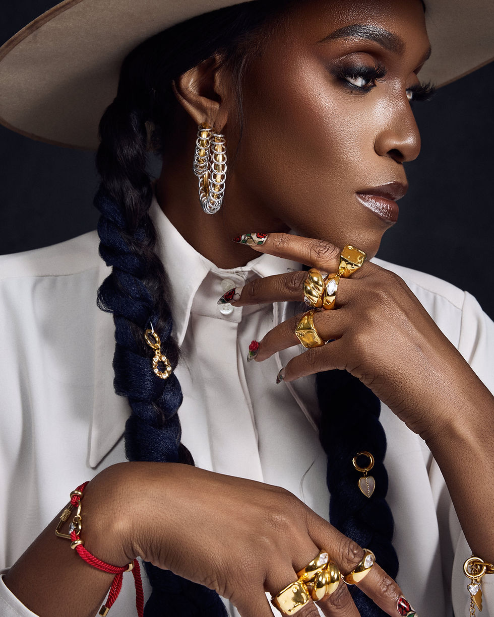 Statement gold hoop earrings, tarnish-resistant and lightweight.