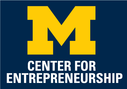 M CFE Stacked white full text blue back.png
