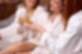 cropped-ladies-bathrobes-clinking-glasses-champagne-while-celebrating-spa.jpg