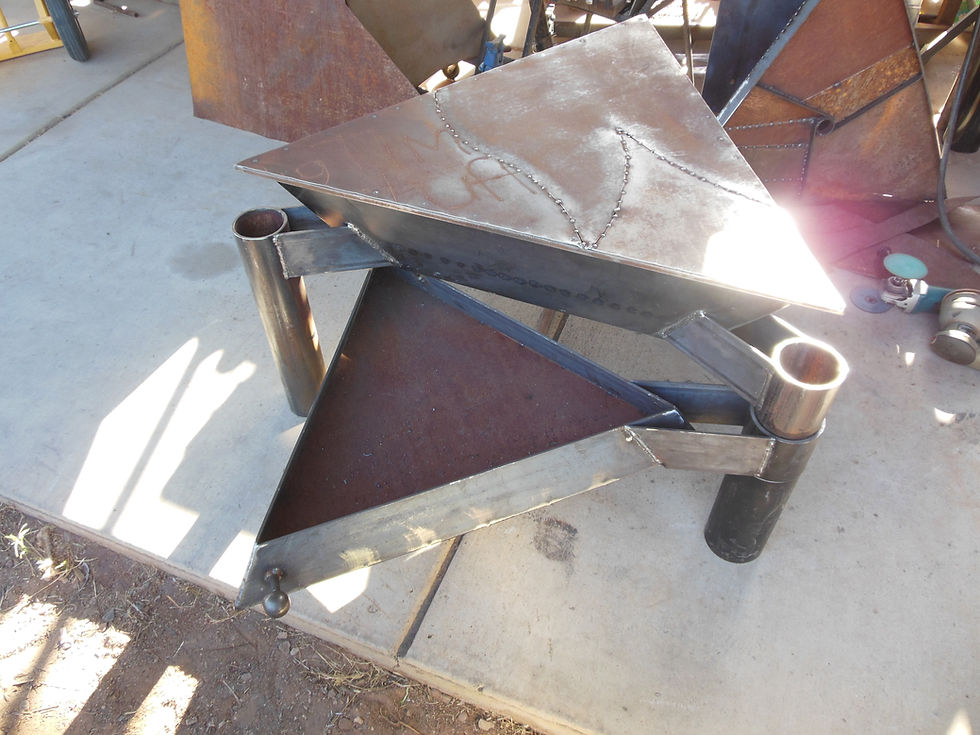 Thumbnail: Triangle Fireplace/Table