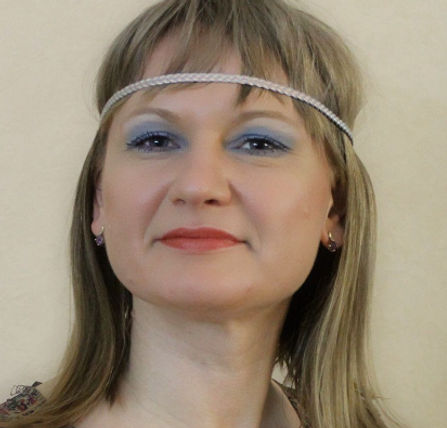 Hippie, disco era traditional makeup look, blue eyes, orange lips