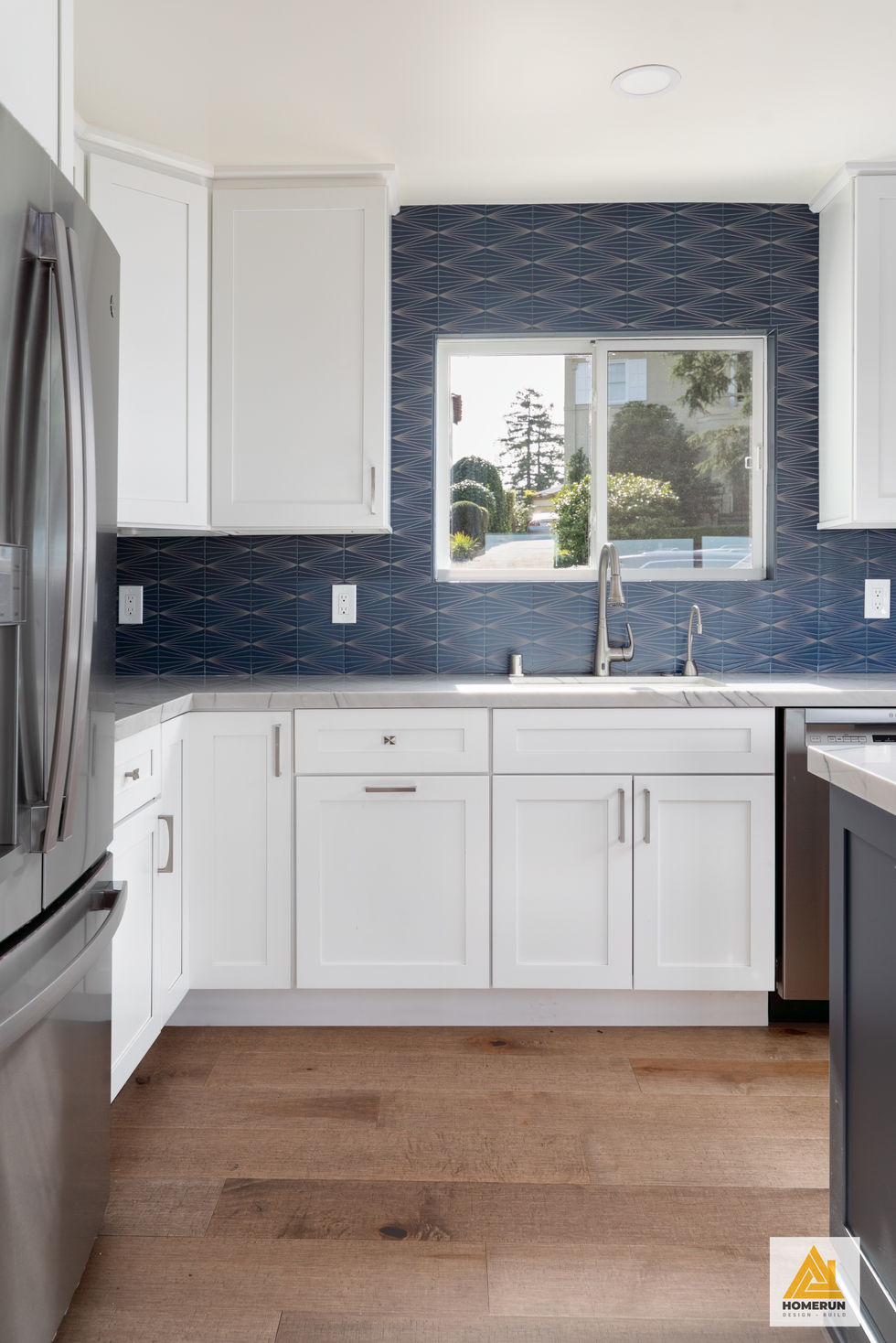 Kitchen remodel blue backsplash