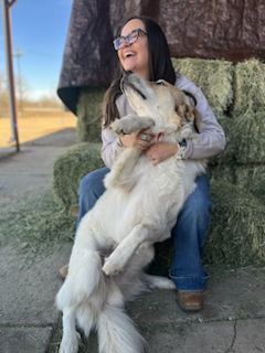 Woman with dog on Front Range Ranch & Farm Dinners